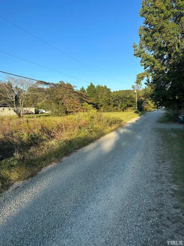 a view of an ocean and a mountain