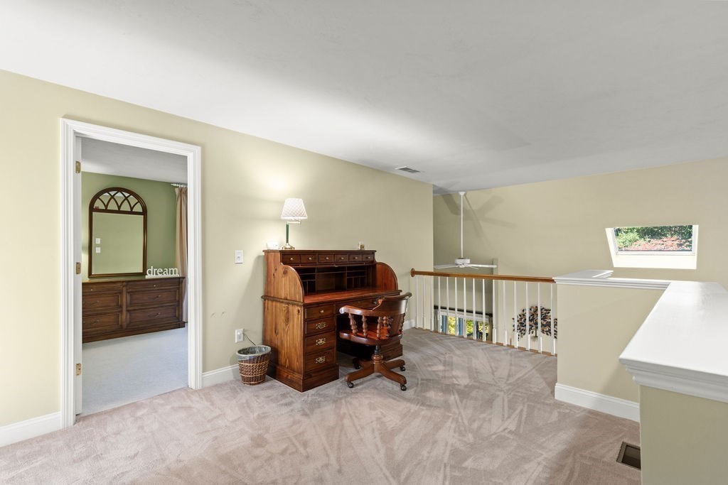 44 Stratford Ridge, Unit 44 Mashpee, MA 02649 - Photo 24 of 40 a view of a room with furniture and windows