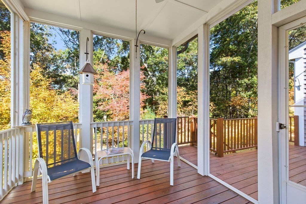 44 Stratford Ridge, Unit 44 Mashpee, MA 02649 - Photo 27 of 40 a view of front door with wooden floor and outdoor space
