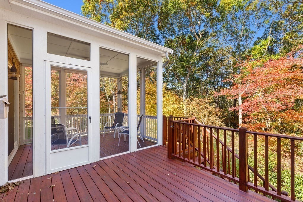 44 Stratford Ridge, Unit 44 Mashpee, MA 02649 - Photo 5 of 40 a view of a house with wooden deck