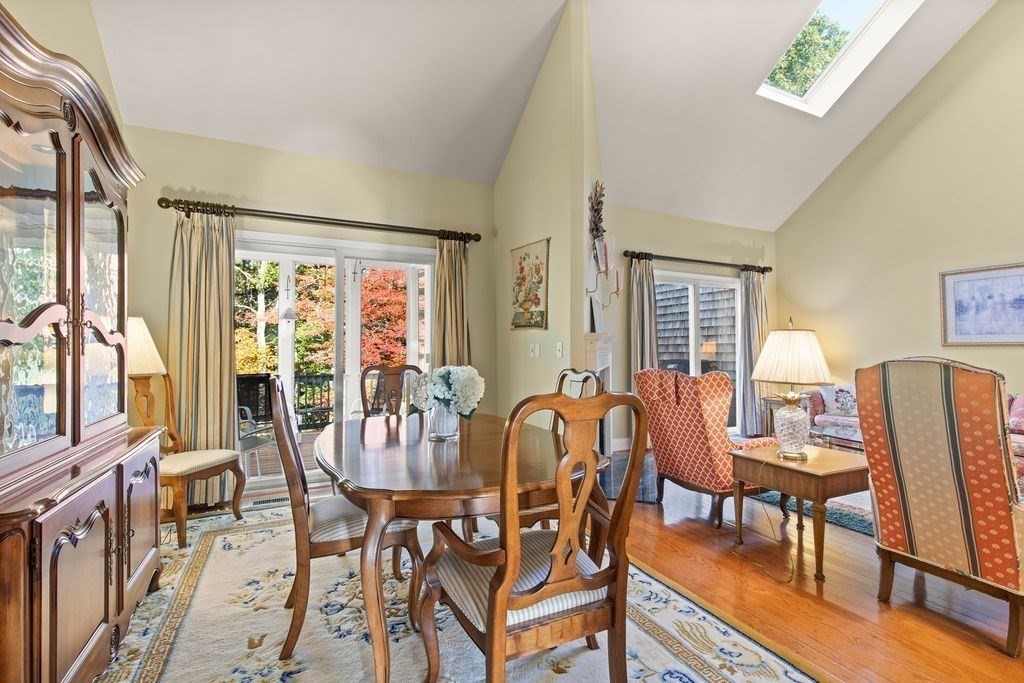 44 Stratford Ridge, Unit 44 Mashpee, MA 02649 - Photo 10 of 40 a view of a dining room with furniture window and outside view