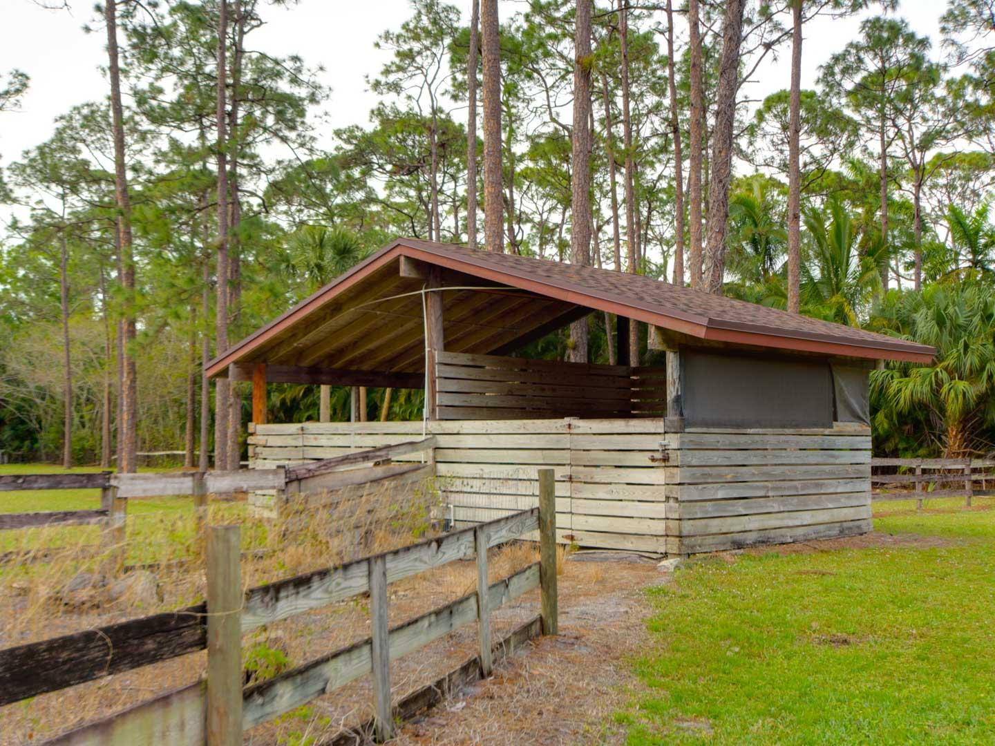 2477 West G Road Loxahatchee, FL 33470 - Photo 14 of 61 a view of a house with a yard