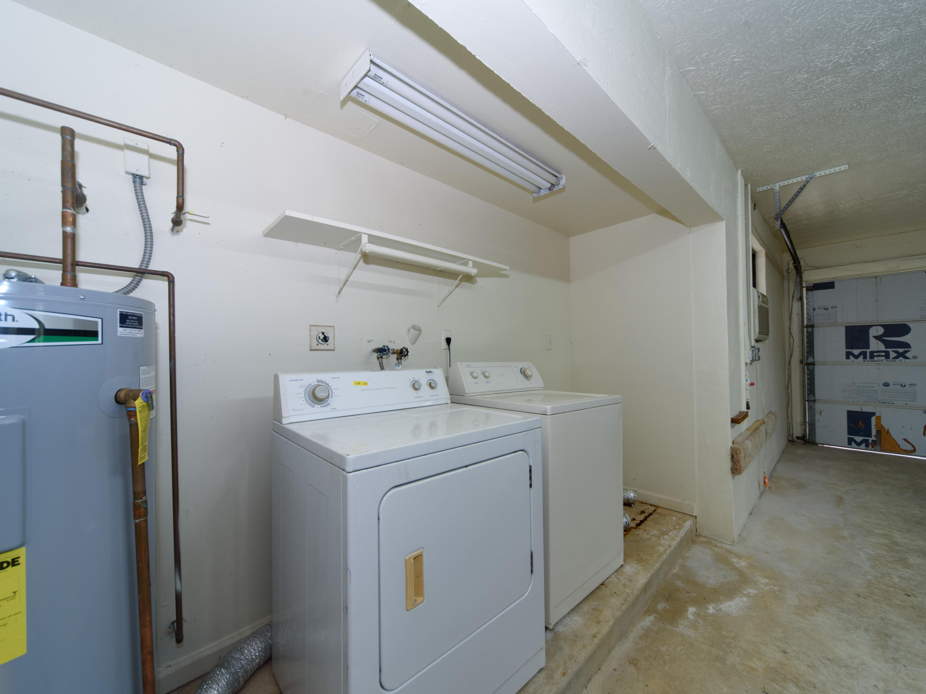 2477 West G Road Loxahatchee, FL 33470 - Photo 43 of 61 a utility room with dryer and washer