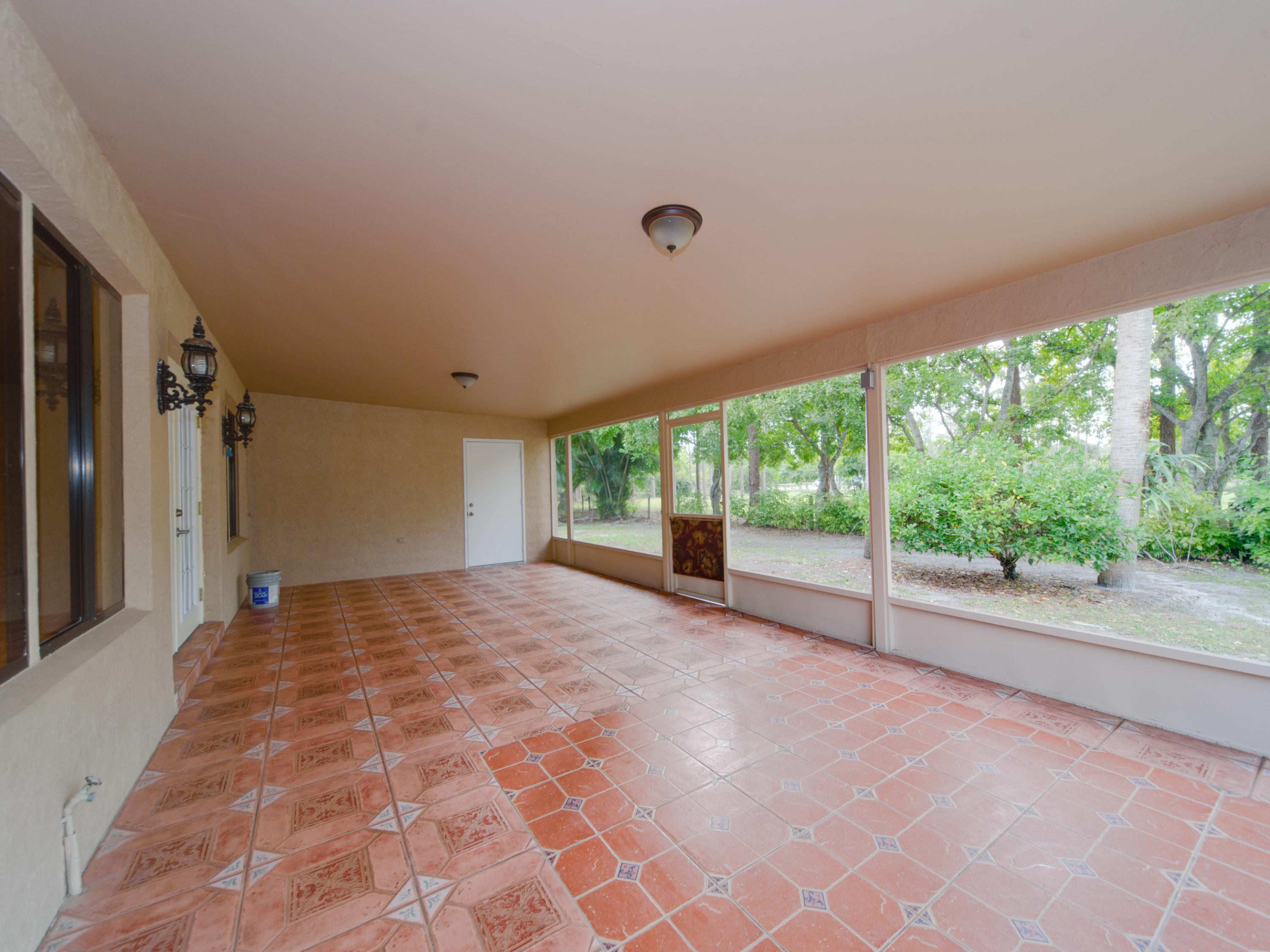 2477 West G Road Loxahatchee, FL 33470 - Photo 48 of 61 a view of a room with a large window