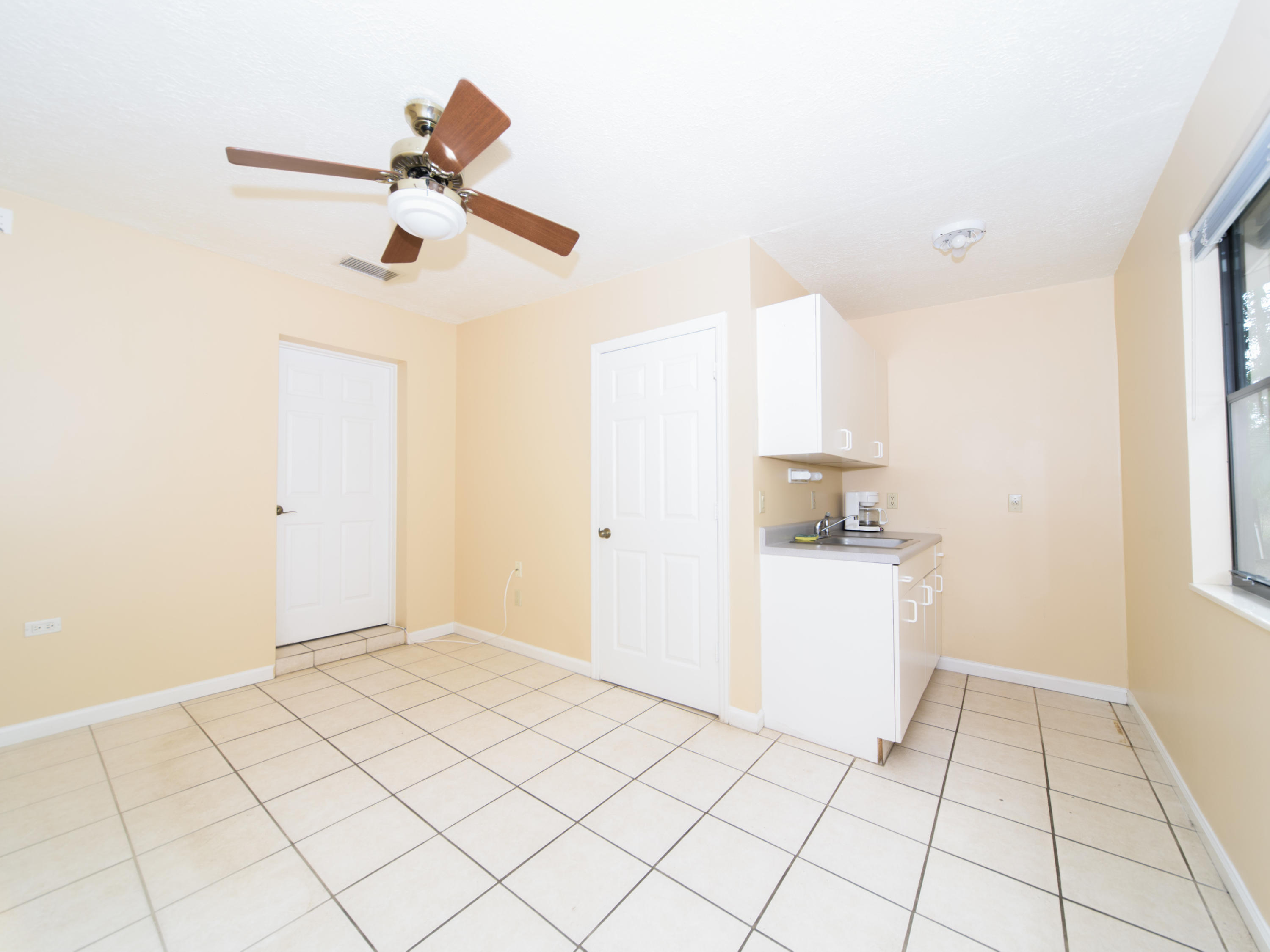 2477 West G Road Loxahatchee, FL 33470 - Photo 54 of 61 a view of a kitchen with a sink