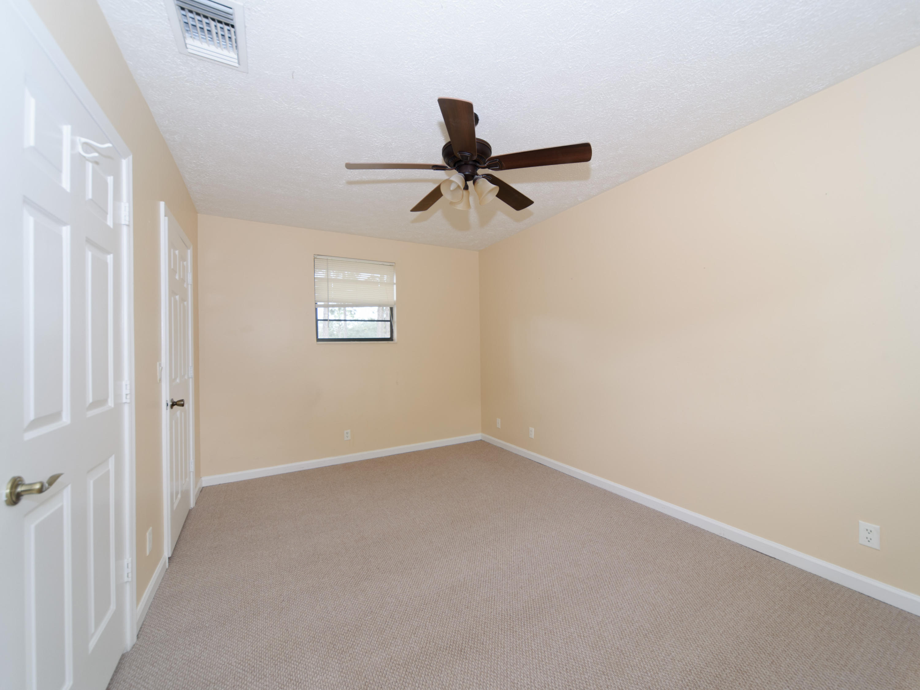 2477 West G Road Loxahatchee, FL 33470 - Photo 60 of 61 a view of a window in an empty room