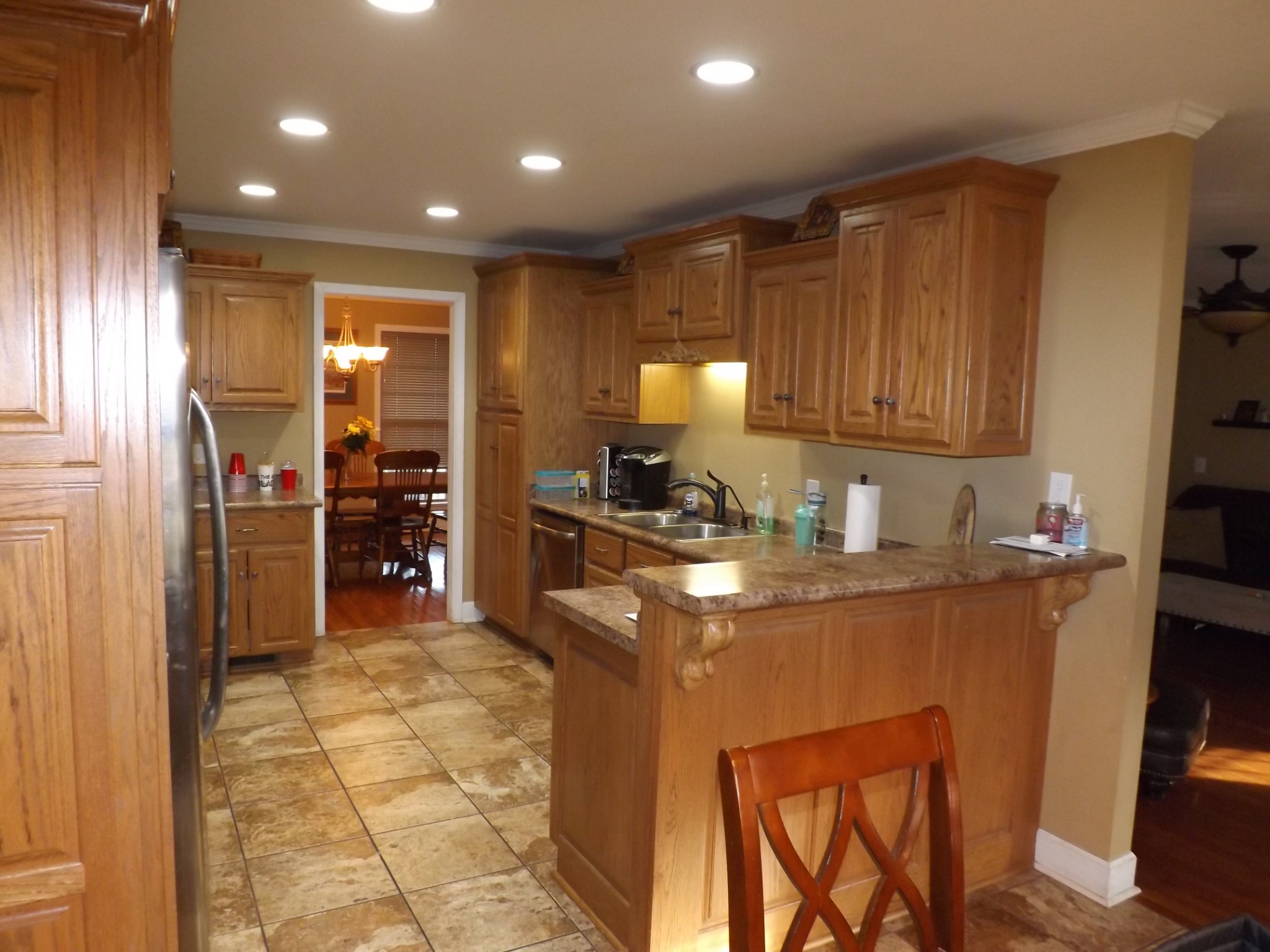 2591 Briar Patch Road Prospect, TN 38477 - Photo 11 of 48 a kitchen with stainless steel appliances granite countertop a refrigerator stove top oven and sink