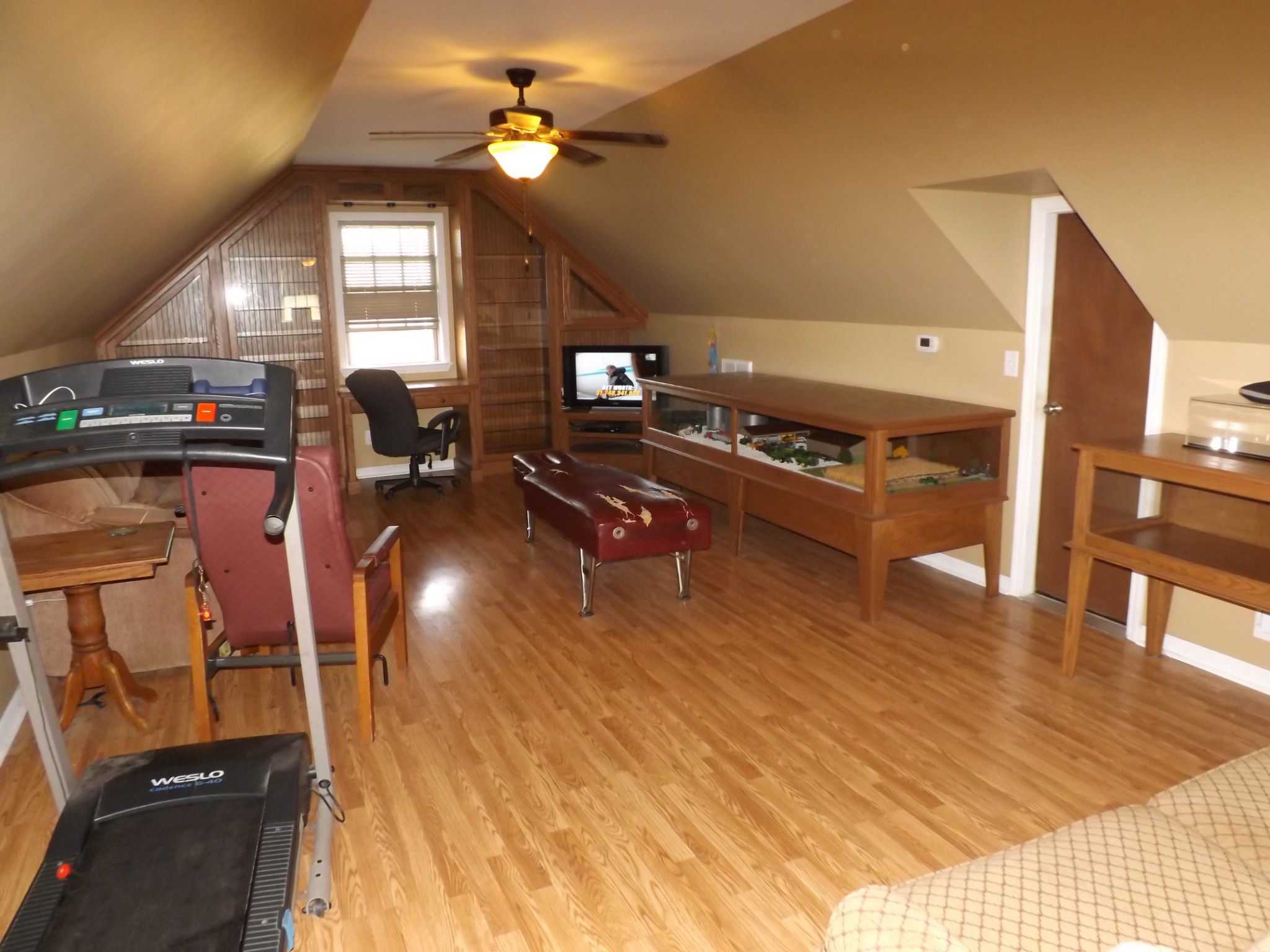 2591 Briar Patch Road Prospect, TN 38477 - Photo 26 of 48 a living room with lots of furniture and a chandelier