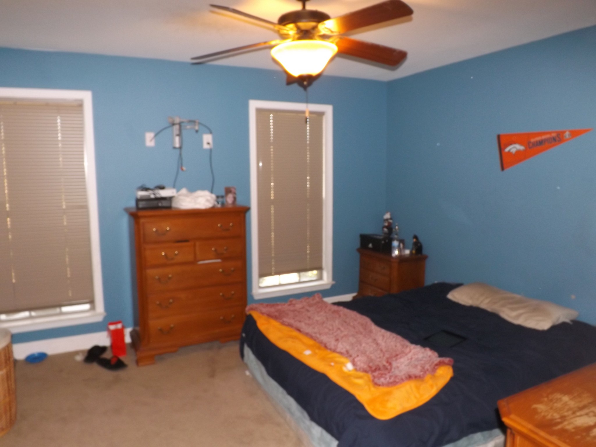 2591 Briar Patch Road Prospect, TN 38477 - Photo 27 of 48 a bedroom with a bed and a chandelier