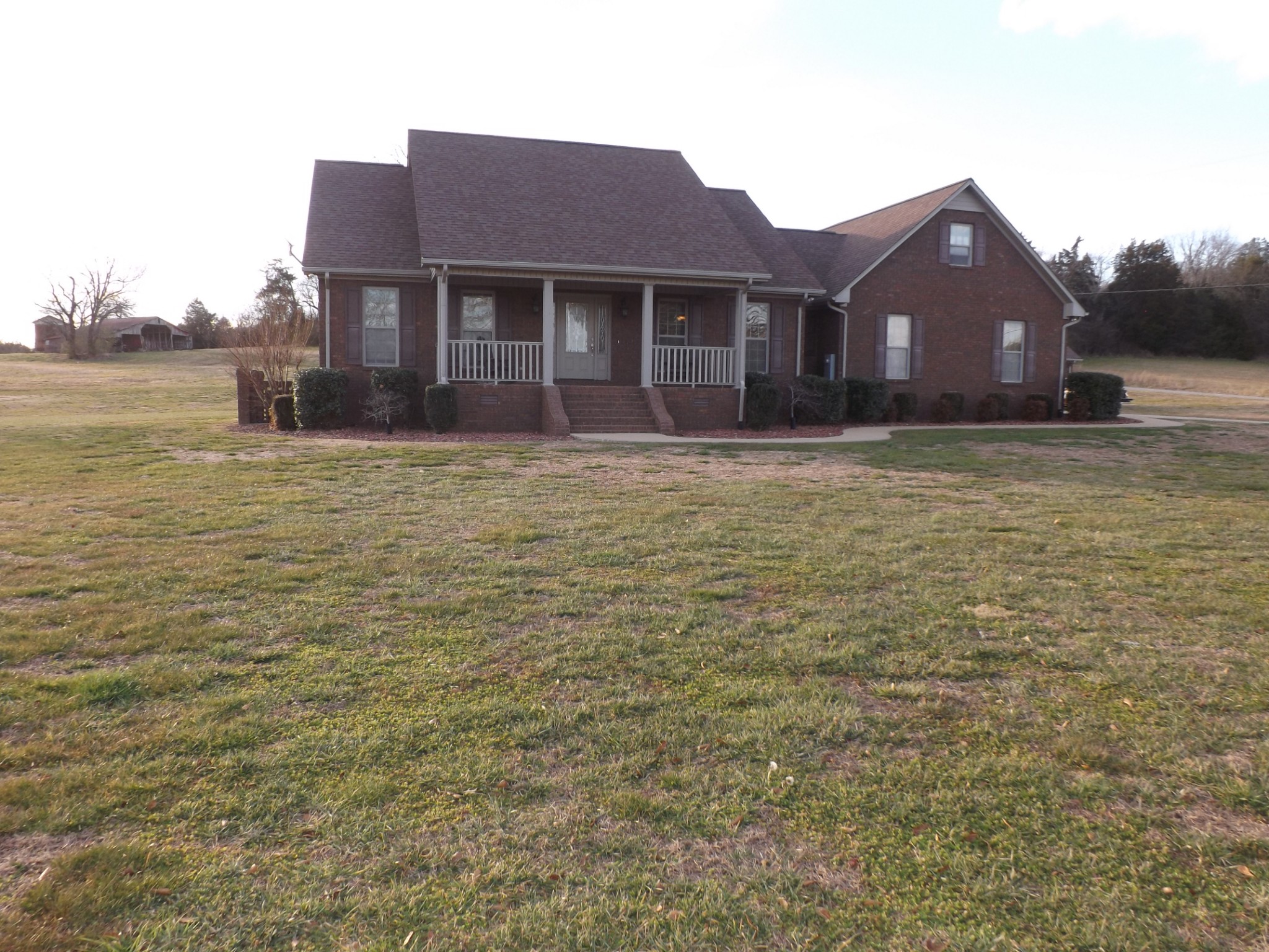 2591 Briar Patch Road Prospect, TN 38477 - Photo 4 of 48 a front view of a house with a garden