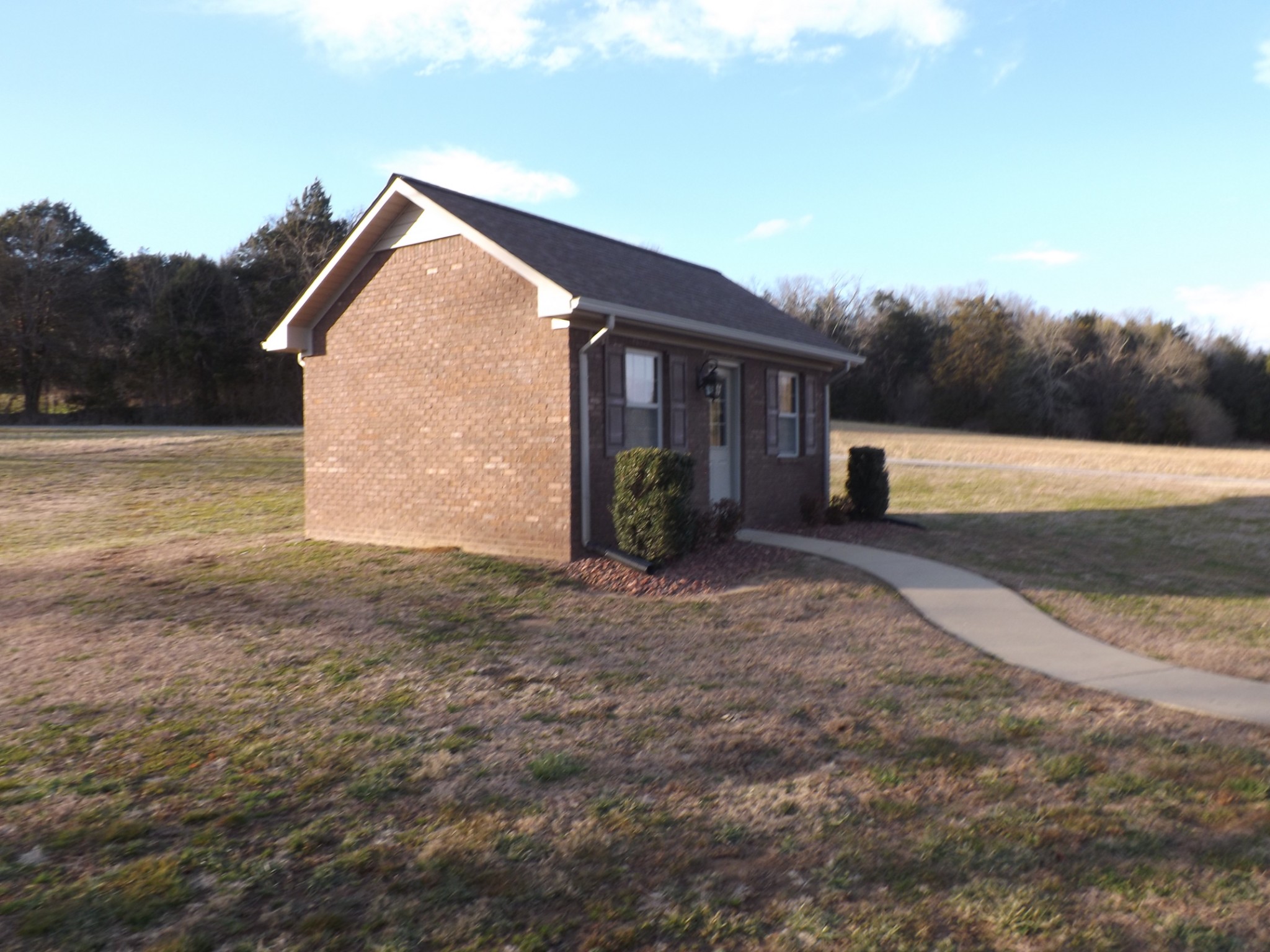 2591 Briar Patch Road Prospect, TN 38477 - Photo 31 of 48 a view of a house with a yard