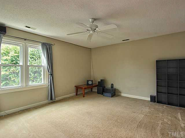 2405 Cookshire Drive Raleigh, NC 27604 - Photo 18 of 25 Bedroom 4 is HUGE and would also make a great bonus or media room.