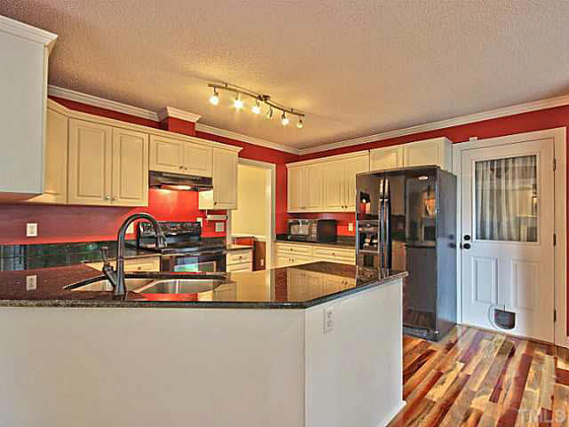 2405 Cookshire Drive Raleigh, NC 27604 - Photo 7 of 25 This is the perfect place to cook all your favorite meals!
