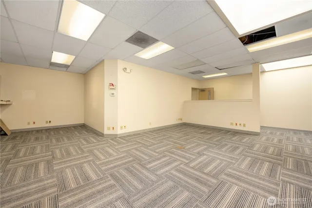 a view of storage and utility room with washer and dryer