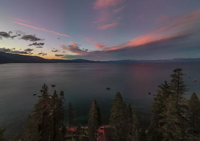a view of beach and sunset