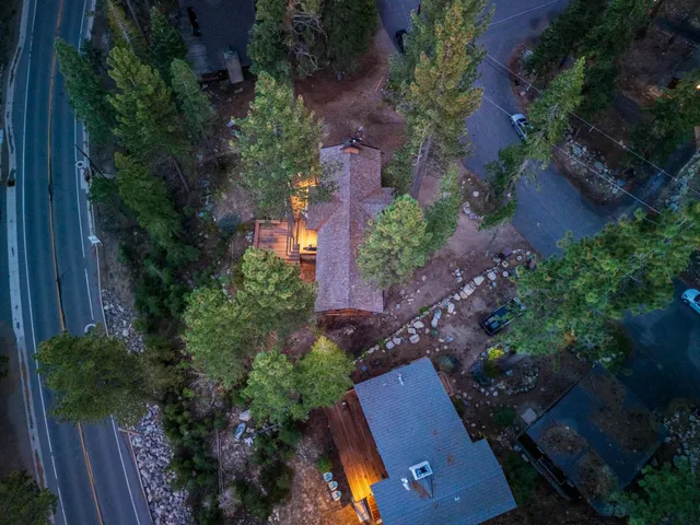 an aerial view of house with yard