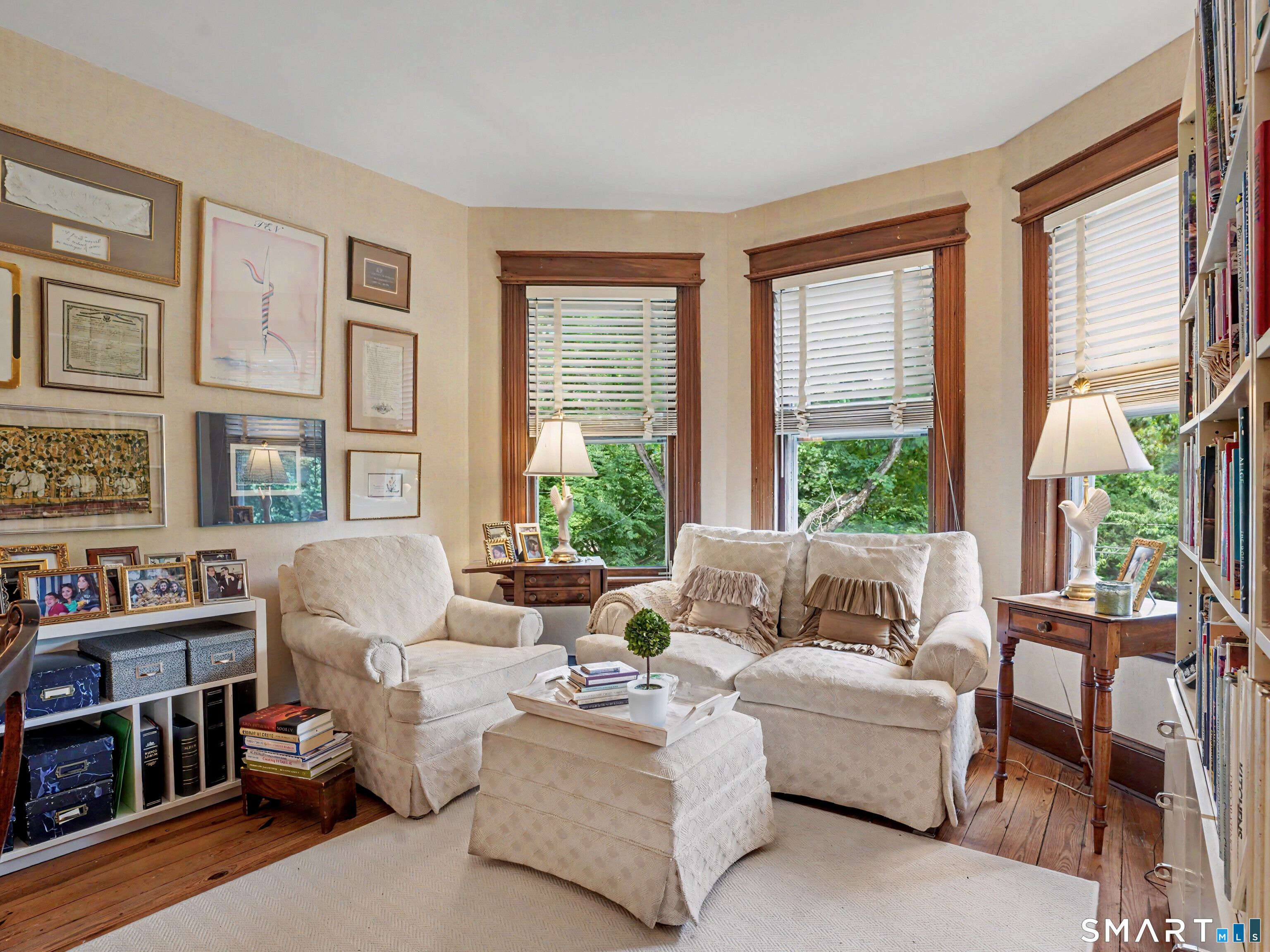 2477 Bronson Road Fairfield, CT 06824 - Photo 18 of 39 a living room with furniture and a large window