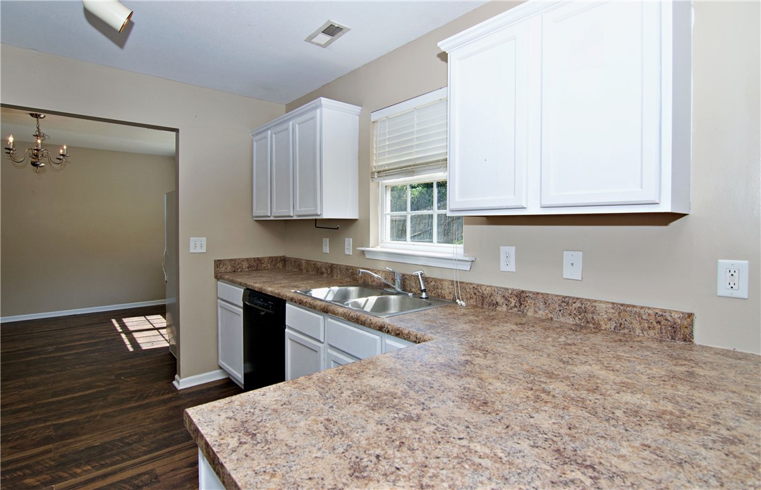 305 North Chestnut Street Seneca, SC 29678 - Photo 13 of 44 Functional kitchen with ample counter space and well-appointed cabinetry awaits.
