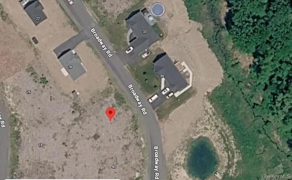 an aerial view of houses with outdoor space