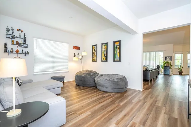 a spacious bedroom with a bed and a window