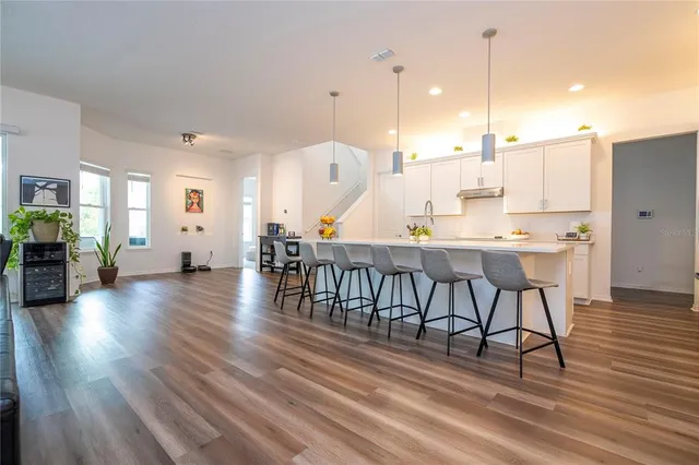 a bathroom with a shower curtain and a toilet