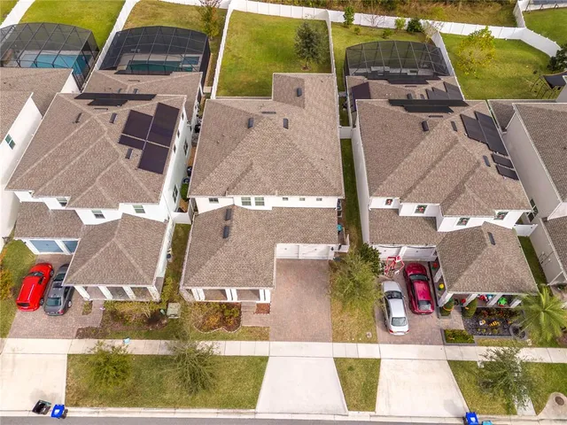 a view of a swimming pool with a yard