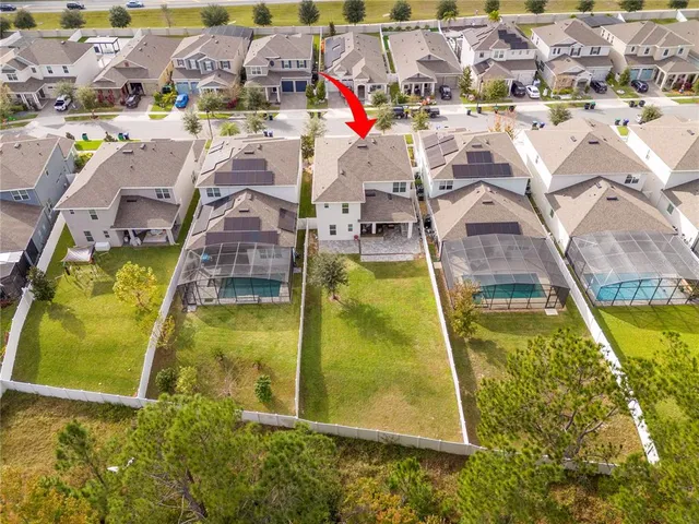 a view of a hallway view with wooden floor and living room