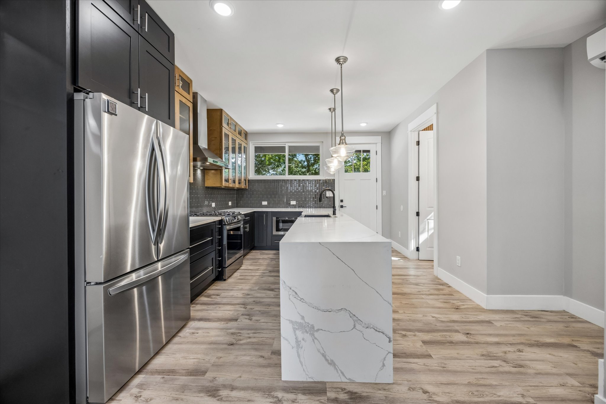 7905-7907 Tiffany Drive Austin, TX 78749 - Photo 24 of 36 Modern kitchen with kitchen island (guest house)