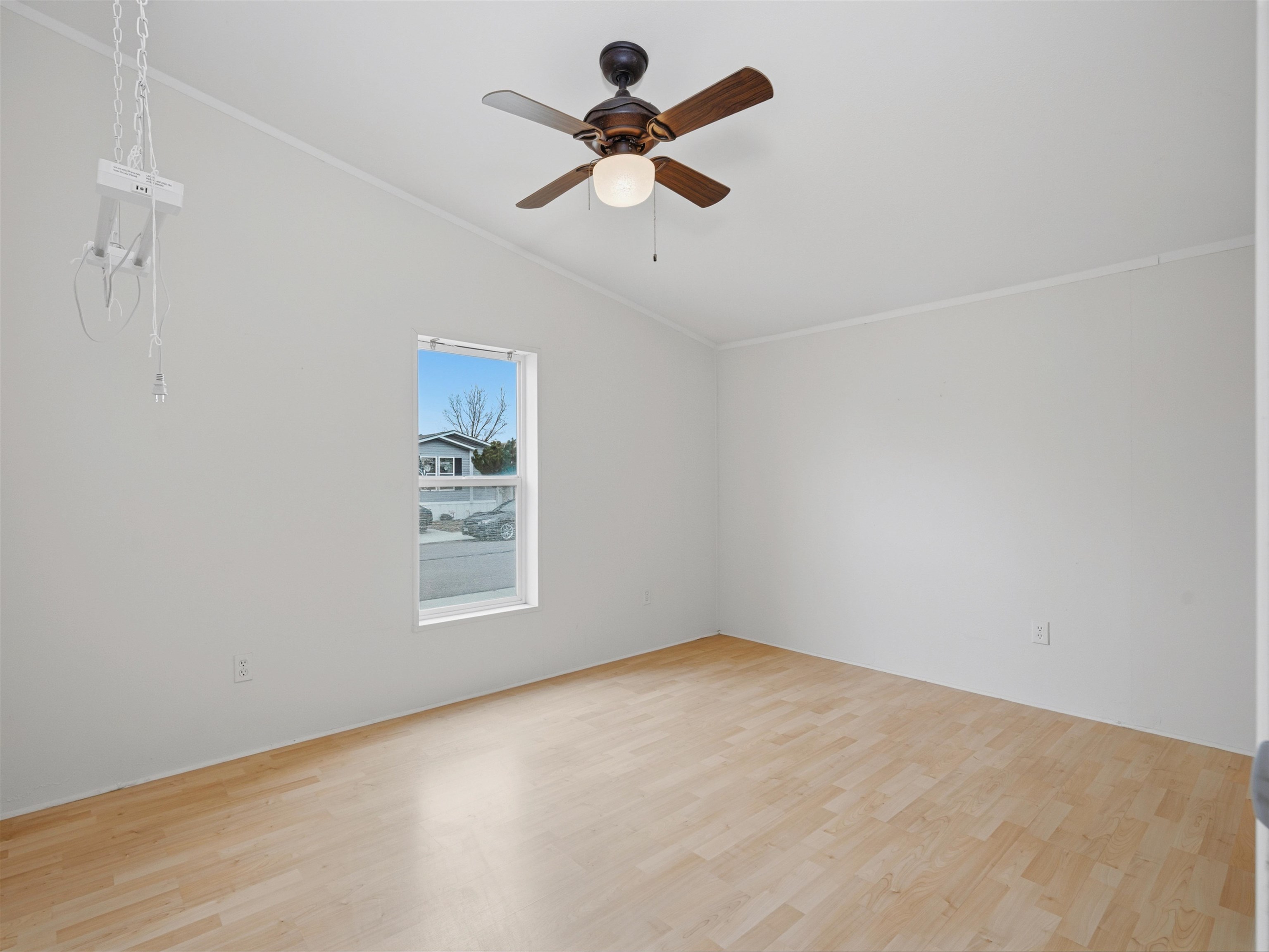 435 32 Road, Unit 832 Clifton, CO 81520 - Photo 13 of 27 an empty room with ceiling fan and window