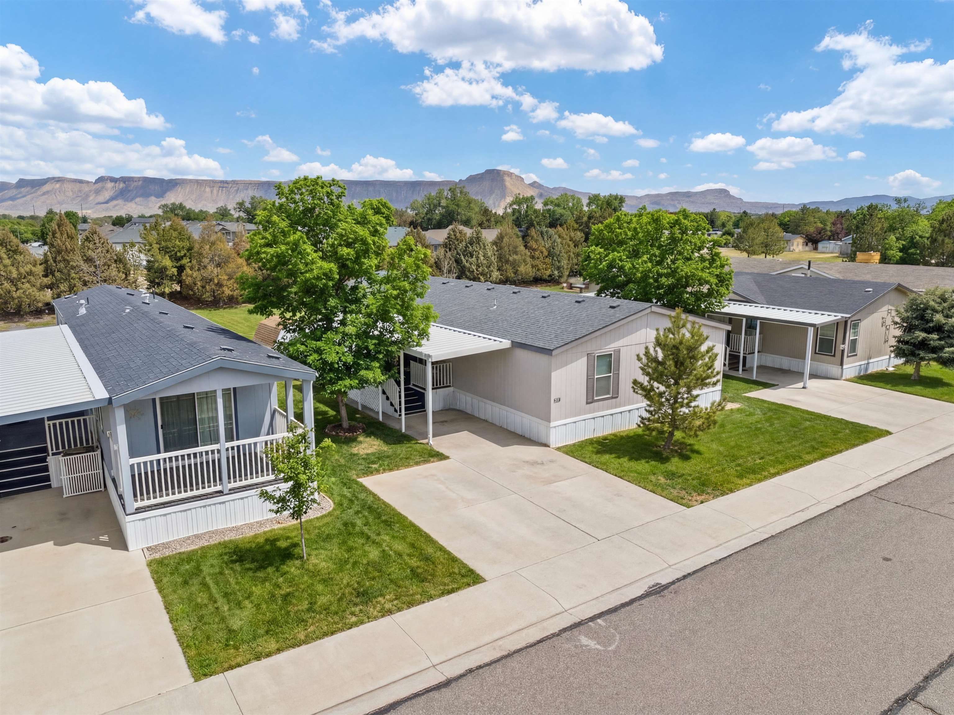 435 32 Road, Unit 832 Clifton, CO 81520 - Photo 2 of 25 front view of a house with a yard