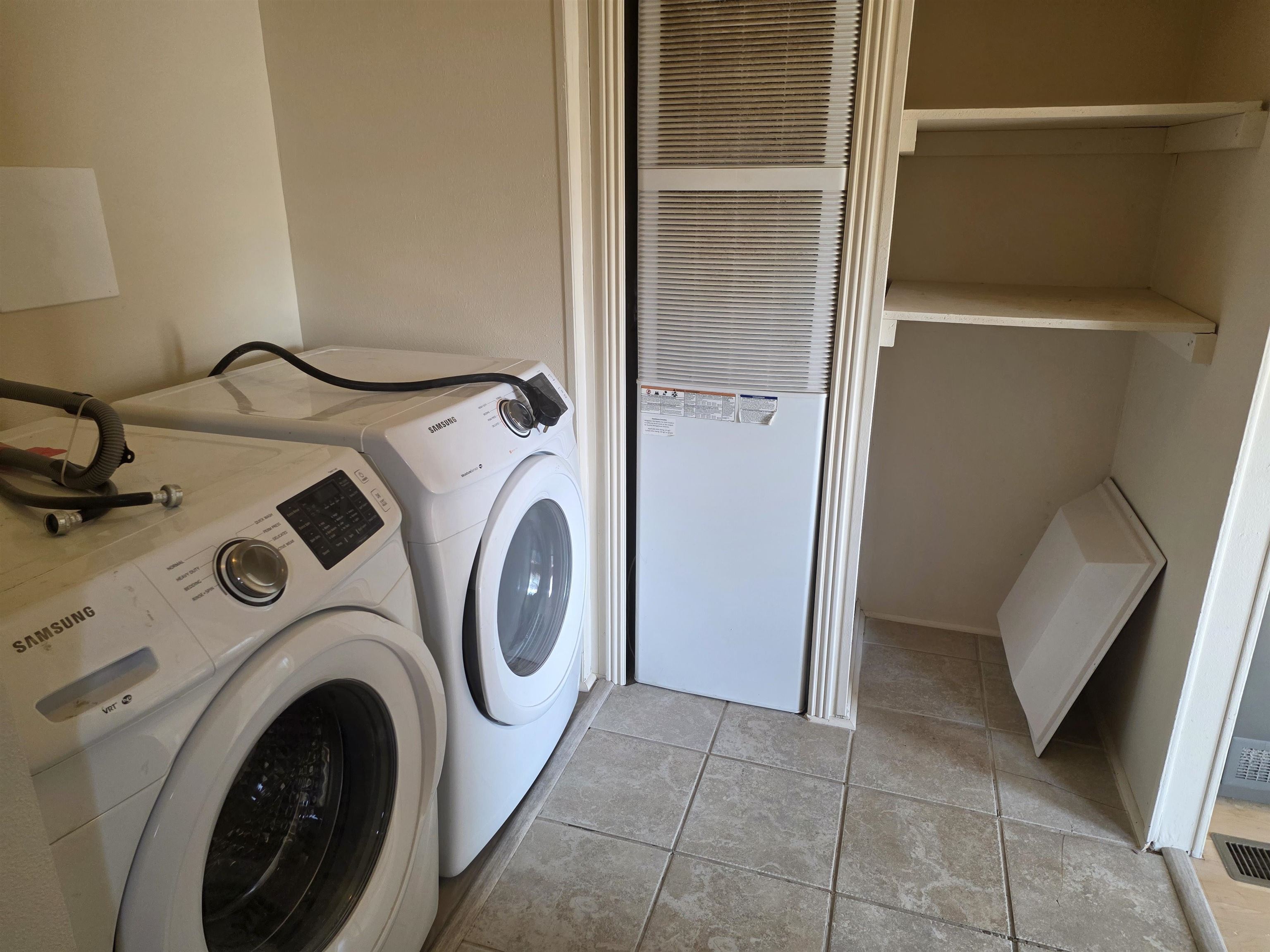 435 32 Road, Unit 832 Clifton, CO 81520 - Photo 23 of 27 a utility room with dryer and washer