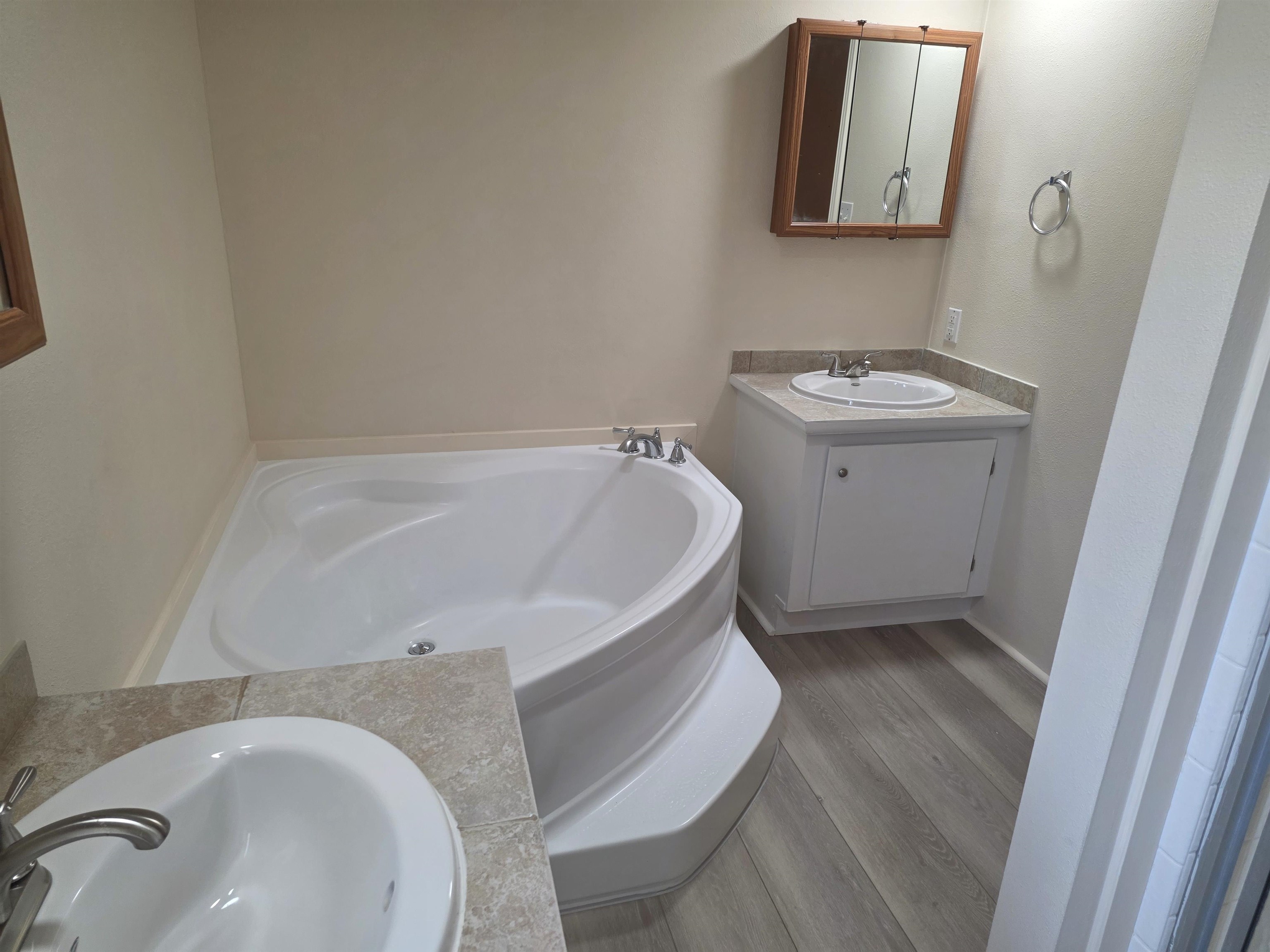 435 32 Road, Unit 832 Clifton, CO 81520 - Photo 10 of 27 a bathroom with a sink and mirror with toilet