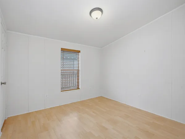 a view of a room with a window