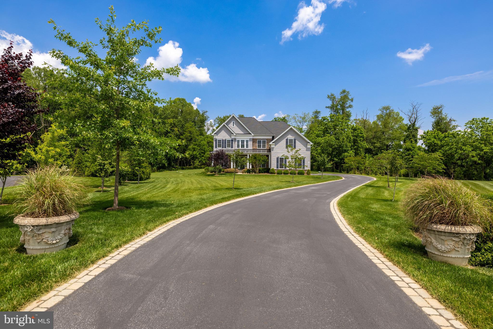 14309 Oak Meadow Road Baldwin, MD 21013 - Photo 2 of 102 a view of a house with a big yard and potted plants