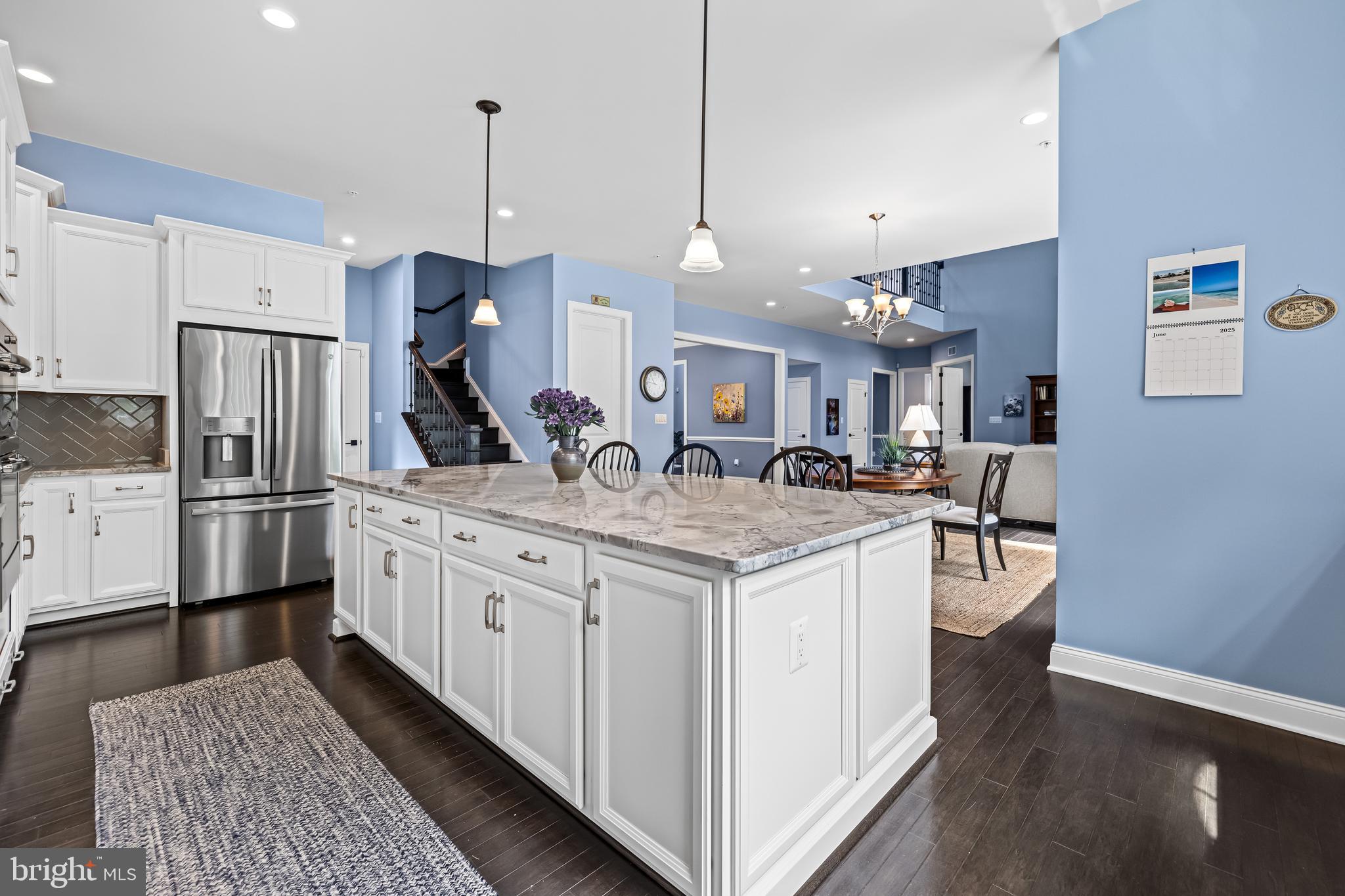 14309 Oak Meadow Road Baldwin, MD 21013 - Photo 34 of 102 a kitchen with stainless steel appliances granite countertop a refrigerator a stove and a sink