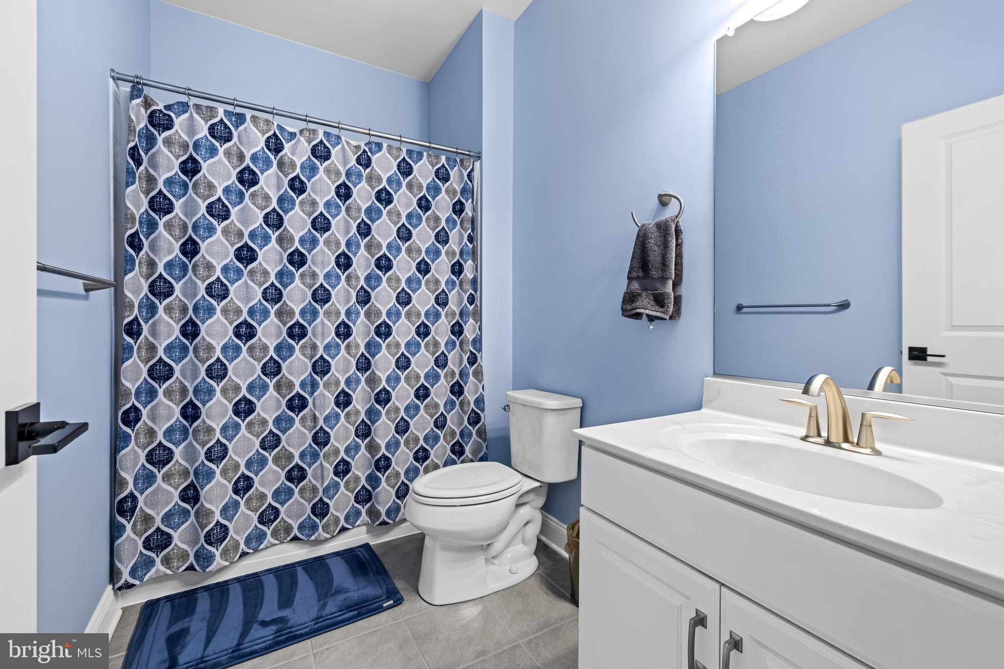 14309 Oak Meadow Road Baldwin, MD 21013 - Photo 53 of 102 a bathroom with a sink and a toilet