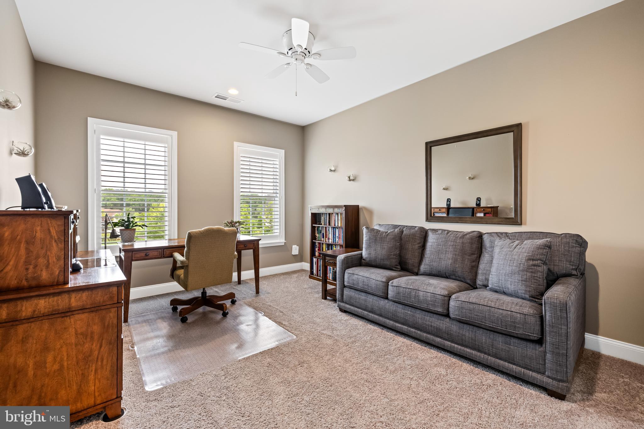 14309 Oak Meadow Road Baldwin, MD 21013 - Photo 54 of 102 a living room with furniture and a flat screen tv