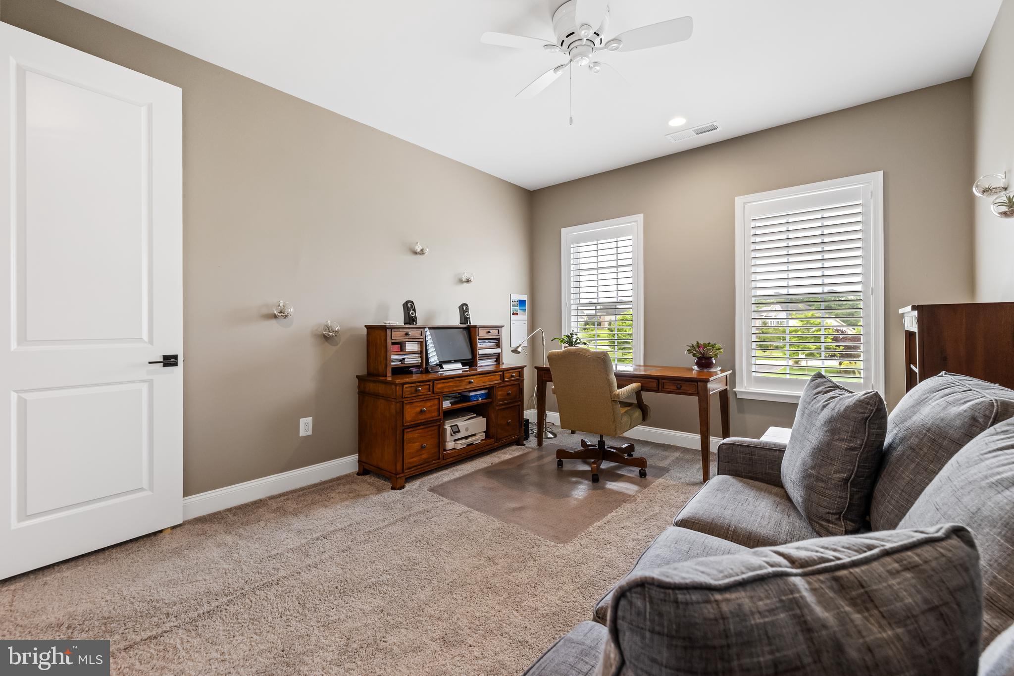 14309 Oak Meadow Road Baldwin, MD 21013 - Photo 55 of 102 a living room with furniture and a flat screen tv