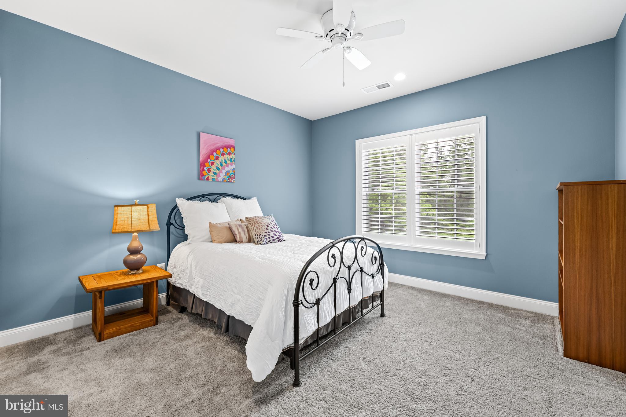 14309 Oak Meadow Road Baldwin, MD 21013 - Photo 56 of 102 a bed sitting in a spacious bedroom next to a window