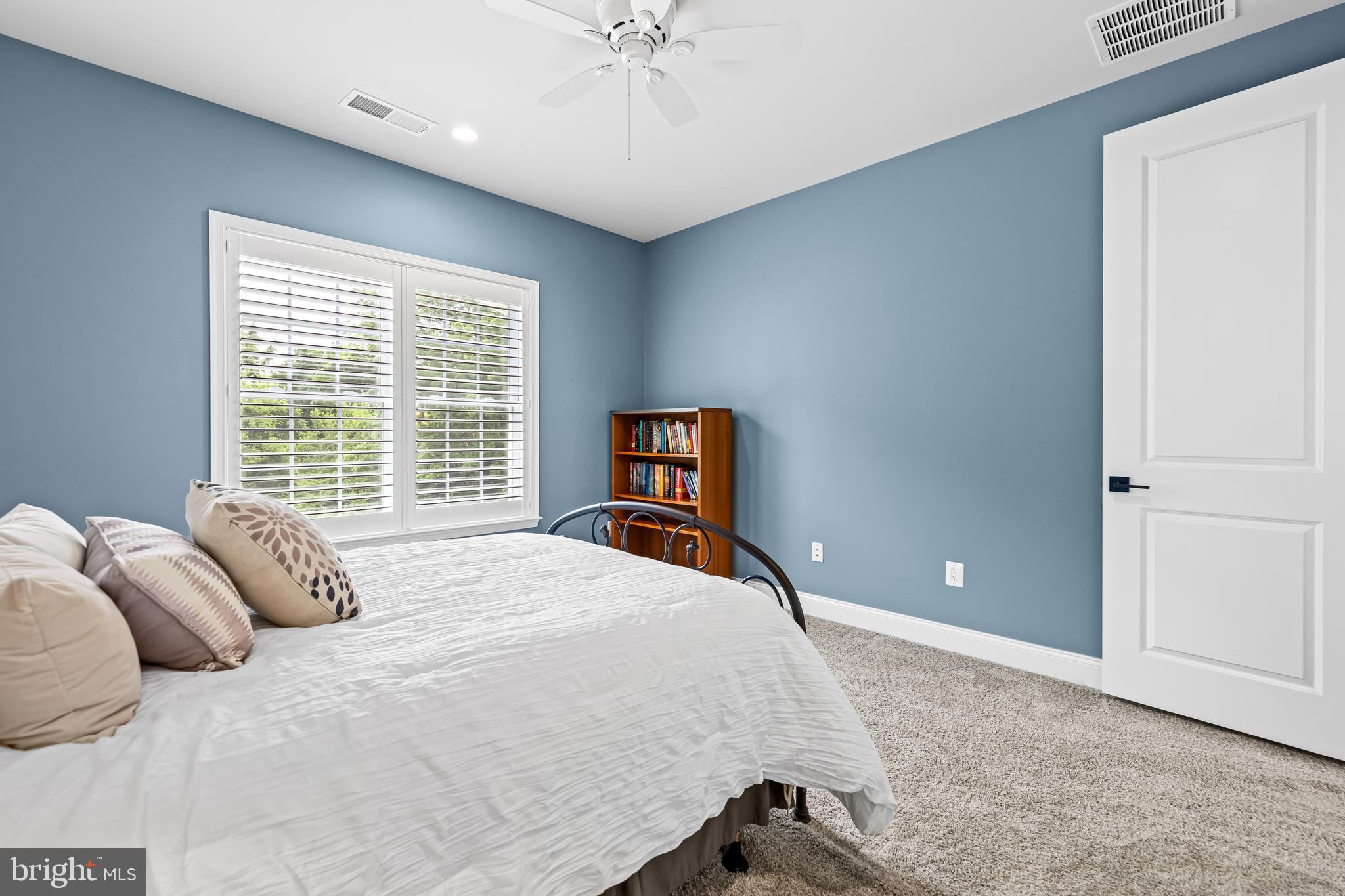 14309 Oak Meadow Road Baldwin, MD 21013 - Photo 57 of 102 a bedroom with a bed and a large window
