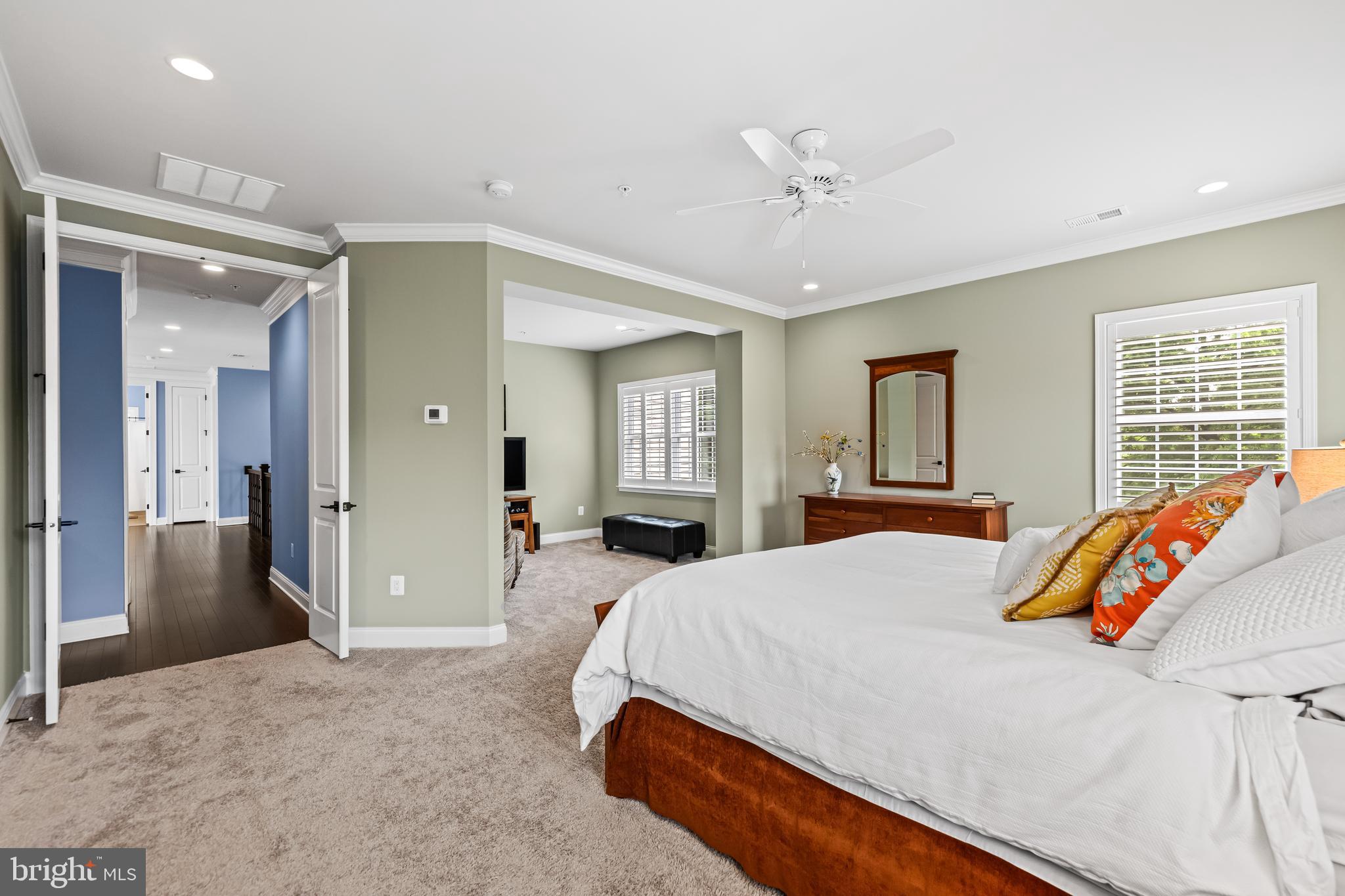 14309 Oak Meadow Road Baldwin, MD 21013 - Photo 61 of 102 a bedroom with a bed and a chandelier