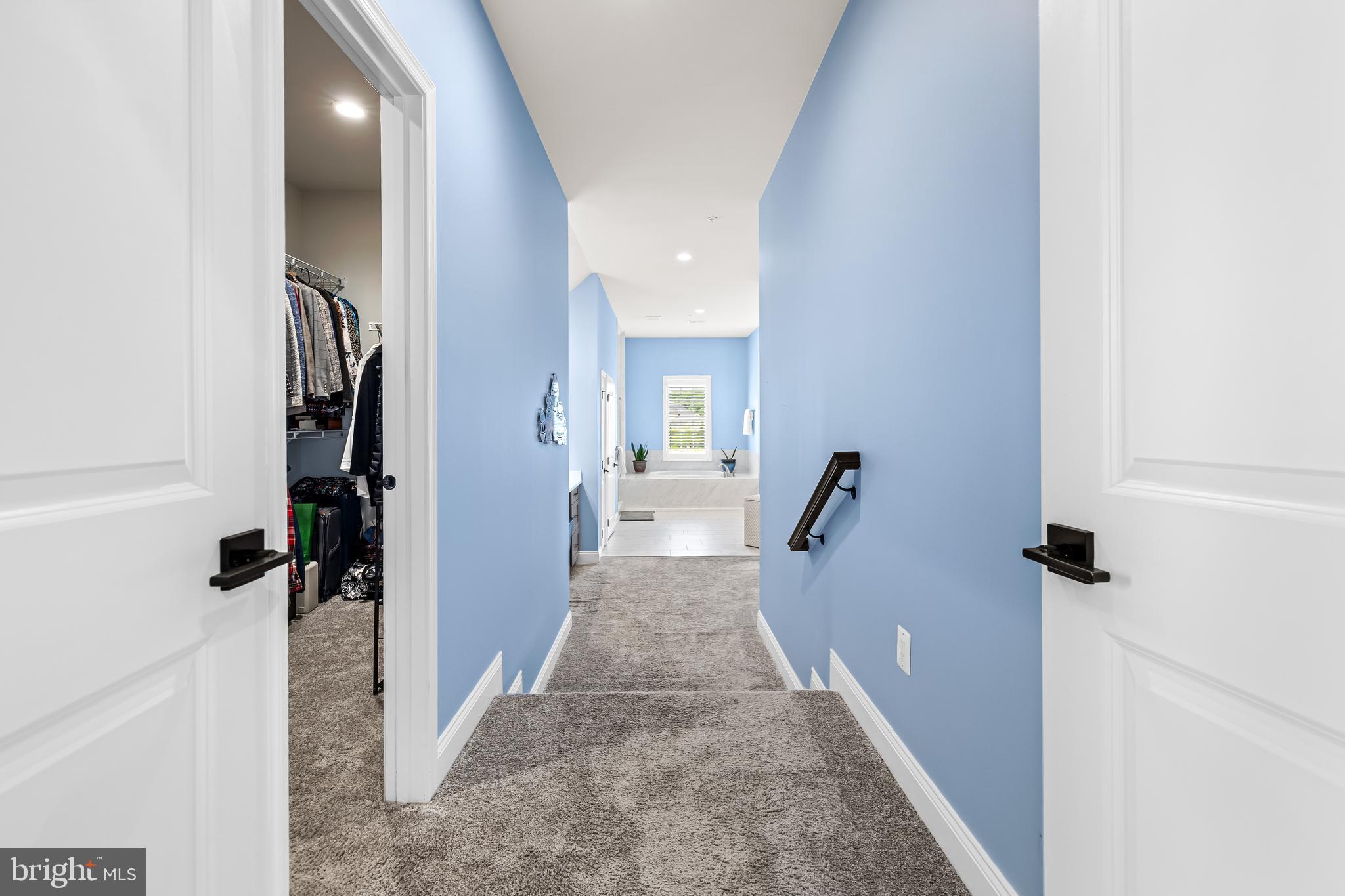 14309 Oak Meadow Road Baldwin, MD 21013 - Photo 66 of 102 a view of a hallway with wooden floor and staircase