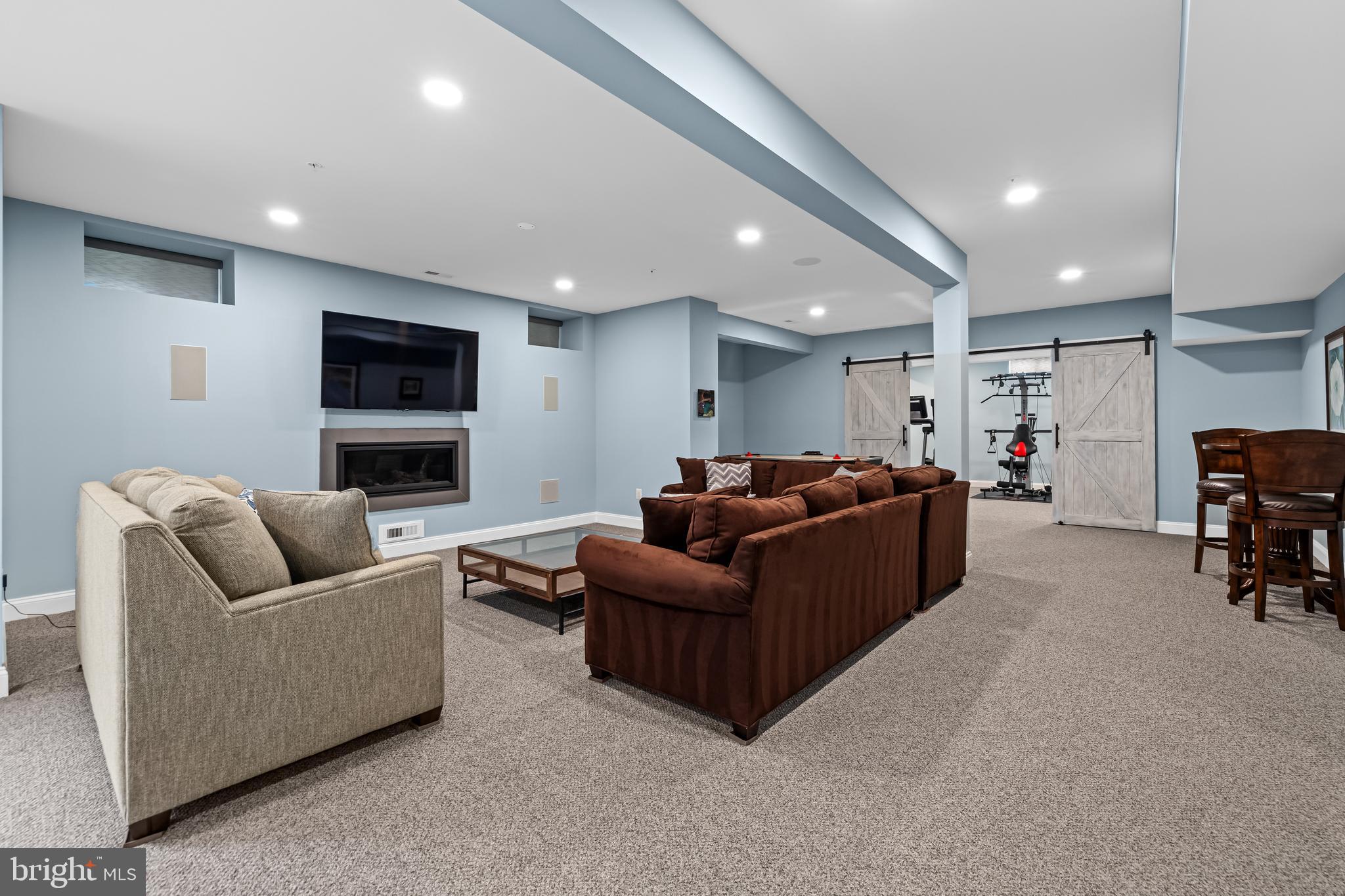 14309 Oak Meadow Road Baldwin, MD 21013 - Photo 78 of 102 a living room with furniture and a flat screen tv