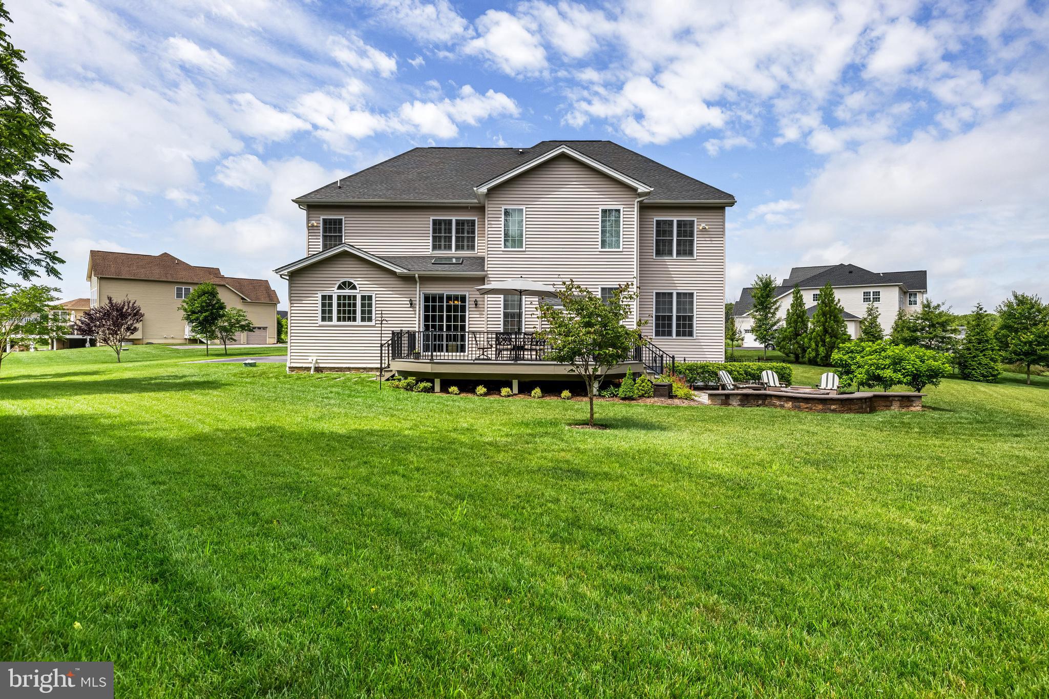 14309 Oak Meadow Road Baldwin, MD 21013 - Photo 89 of 102 a front view of a house with a yard table and chairs