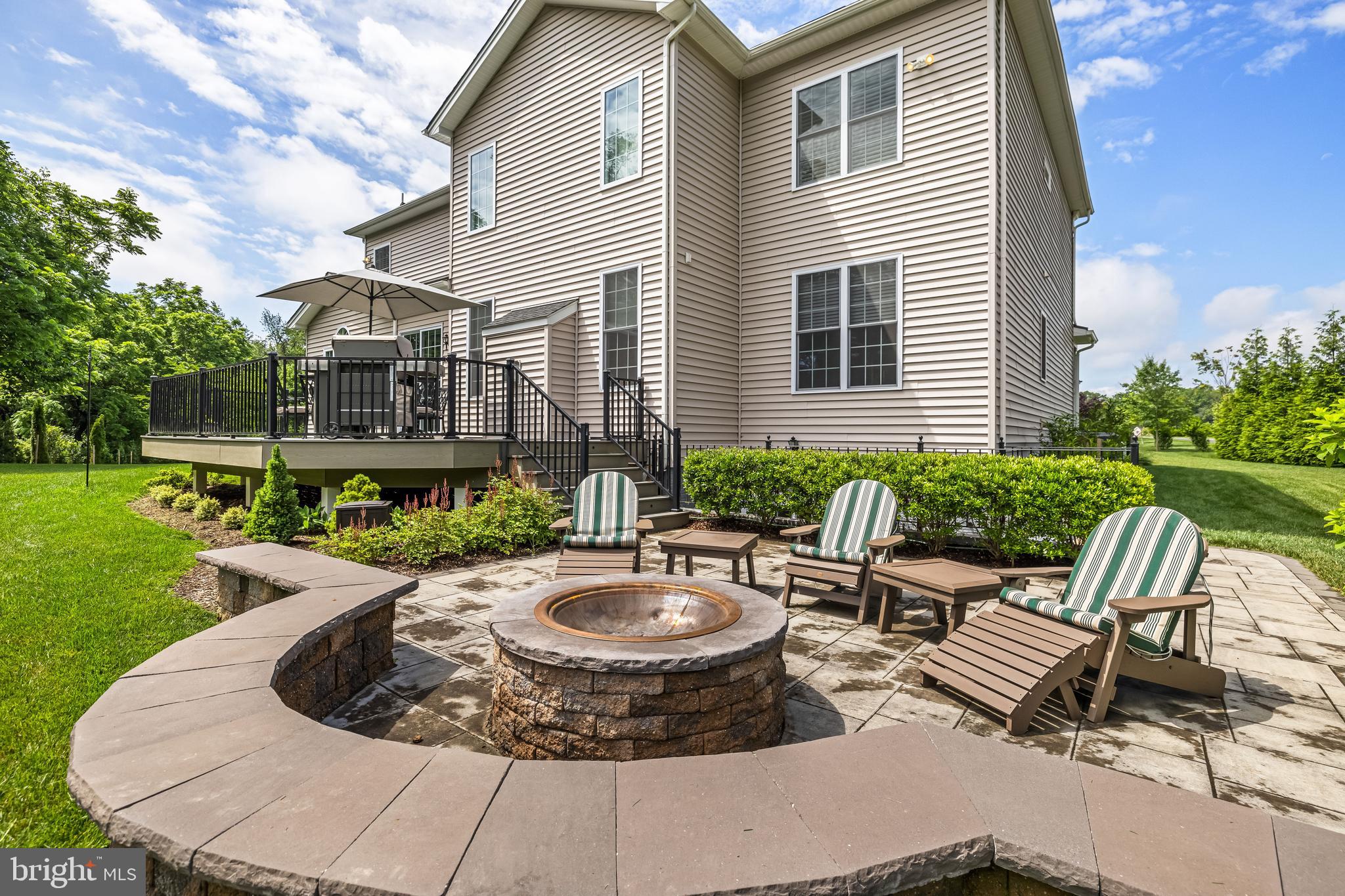 14309 Oak Meadow Road Baldwin, MD 21013 - Photo 91 of 102 a view of a house with backyard sitting area and swimming pool