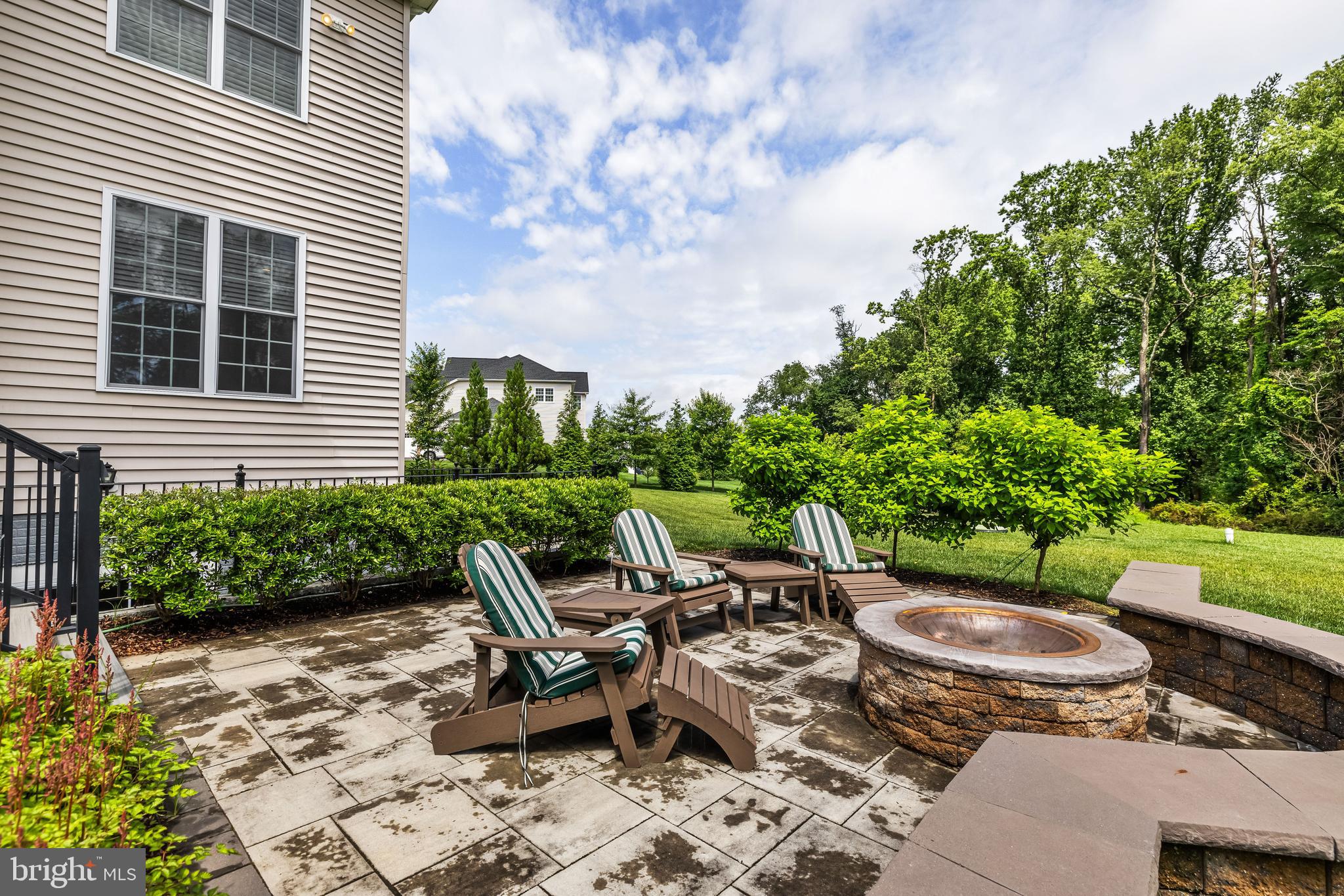 14309 Oak Meadow Road Baldwin, MD 21013 - Photo 94 of 102 a view of a patio with table and chairs potted plants and large tree