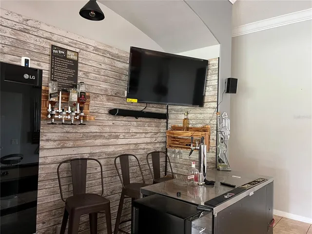 a kitchen with a stove and a microwave