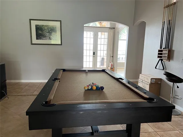 a view of living room with furniture and flat screen tv