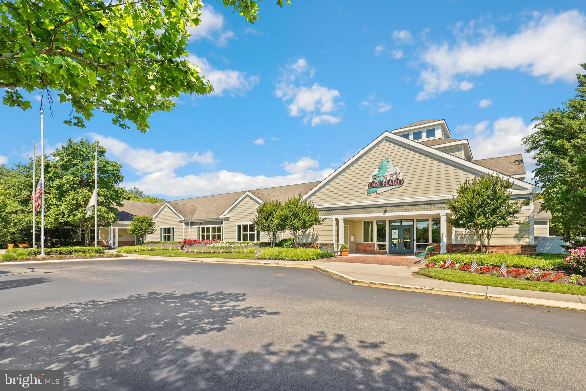 2444 Blue Spring Court, Unit 303 Odenton, MD 21113 - Photo 29 of 33 a front view of a building with street view