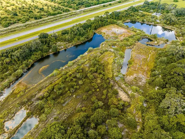 a view of a yard with an outdoor space